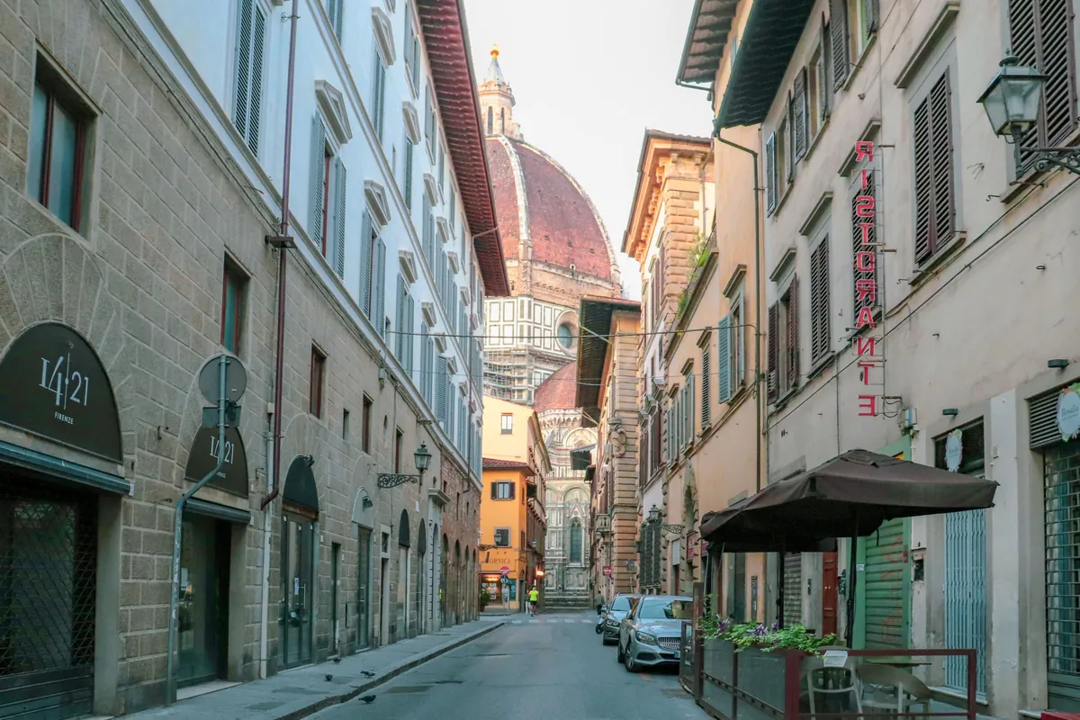 A quiet street leading to the Duomo