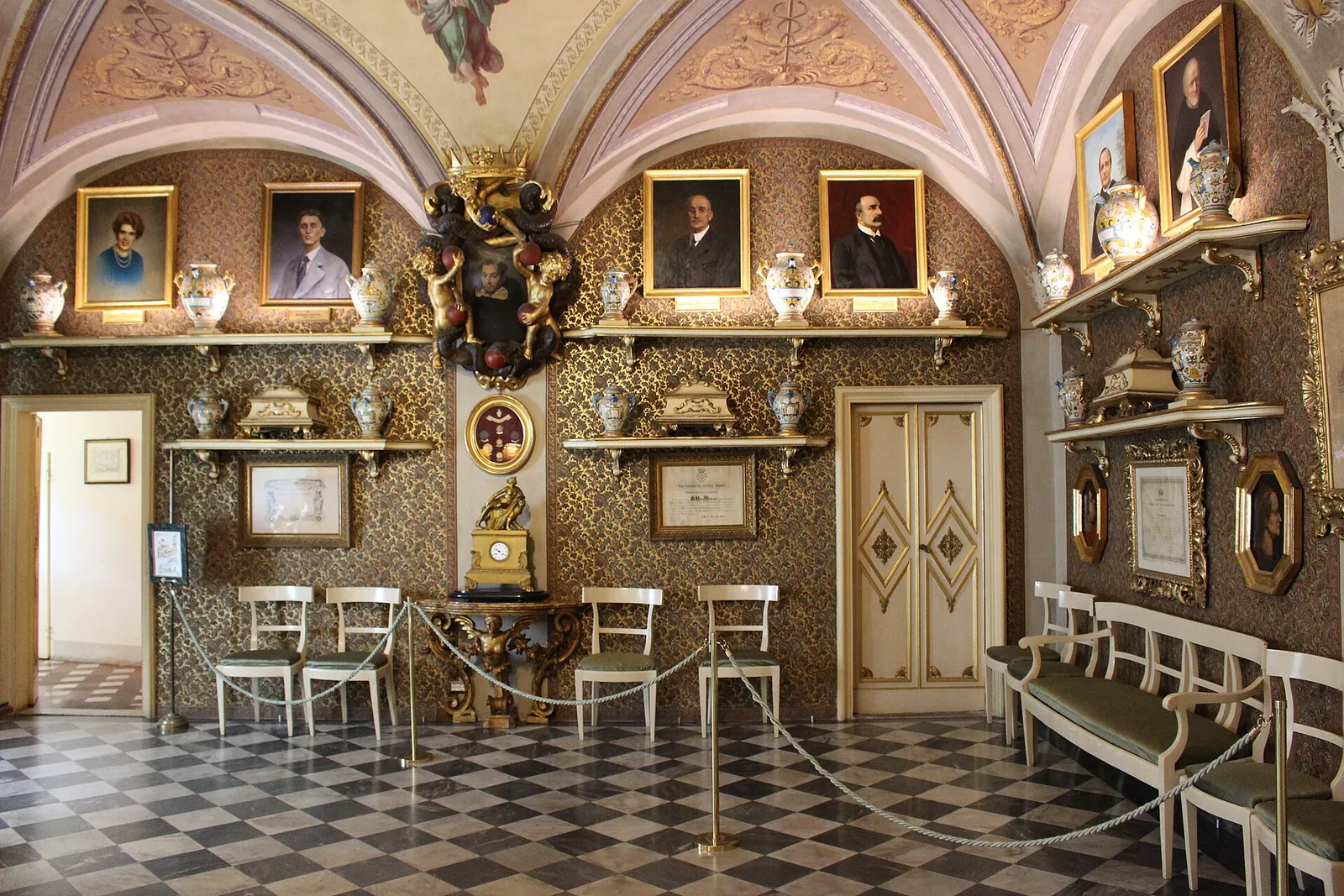 A historic wood-panelled sales room with a chandelier at the Officina Profumo-Farmaceutica di Santa Maria Novella