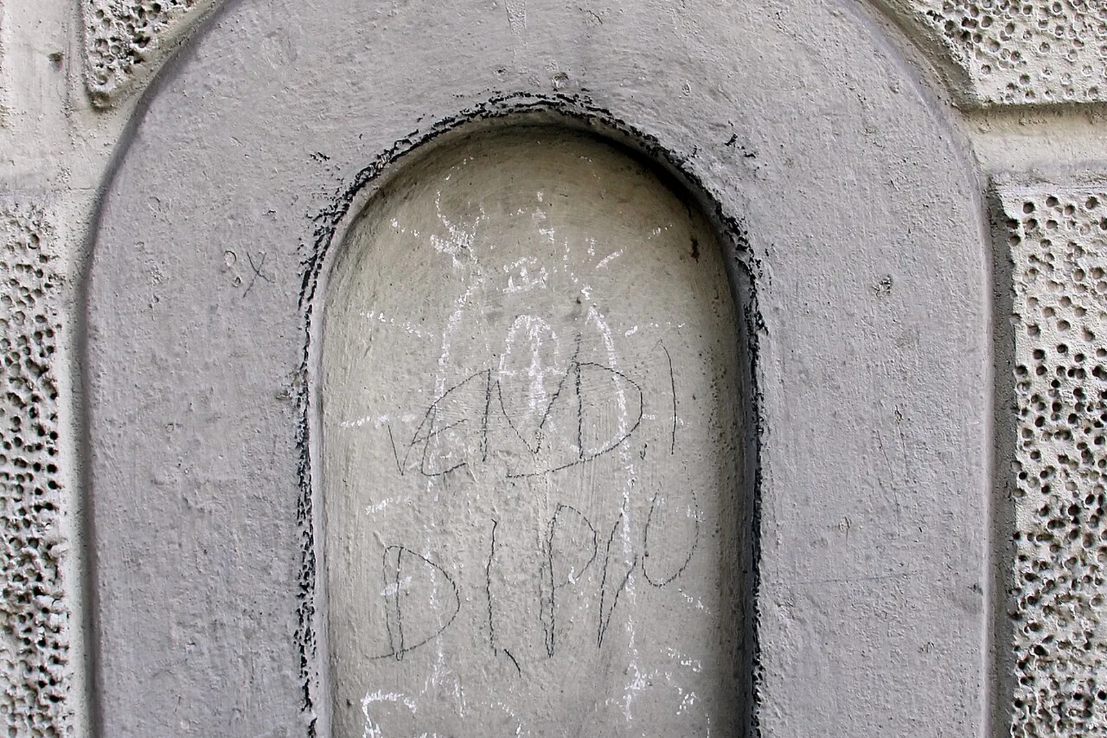 A wine window (buchetta del vino) in the wall of Palazzo Baldi, Florence